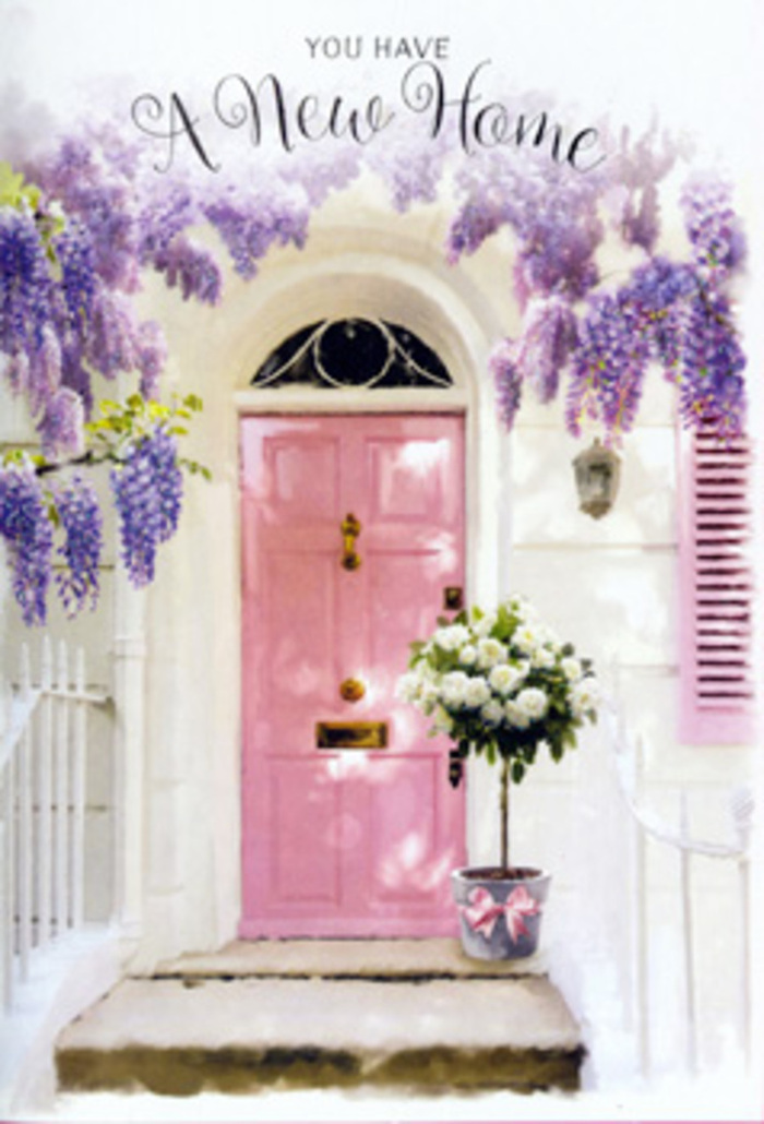 A soft, storybook-like Herne Hill doorway is the focus of this image, where architecture and floristry blend to express the joy and nerves of moving into a new place. The front door is painted a gentle, pastel pink, its surface smooth and freshly finished, radiating a warm, inviting glow that feels instantly homely. The colour has the same soothing character as the blossom you might see in spring around Herne Hill's tree-lined streets. Draped above and around the door is a profusion of wisteria, its blossoms falling in long, pendulous clusters of lavender, lilac, and pale purple that sway slightly in the air. The wisteria frames the door like a romantic archway, each tiny flower contributing to an impression of softness, scent, and abundance. The wall behind is whitewashed, simple and slightly textured, allowing the pastel hues to stand out. At the foot of the doorway, on a shallow stone step, a grey metal bucket stands as a deliberately understated container for a lush floral arrangement. Inside, white and creamy roses crowd together, their petals layered and full, capturing the sense of luxury without feeling formal. Small sprigs of green foliage thread between them, introducing a delicate contrast and a touch of natural wildness, as if the flowers might have been gathered from a cottage garden near by. Around the bucket, a pink satin ribbon is tied in an elegant bow, the ends trailing slightly, echoing the door's colour and adding a soft, finishing detail. The light is calm and slightly filtered, perhaps like a late afternoon settling over Brockwell Park, and it wraps the entire scene in warmth. The mood is deeply welcoming, perfectly suited to a housewarming delivery from a Herne Hill florist who understands how flowers can make a new address feel instantly like home.